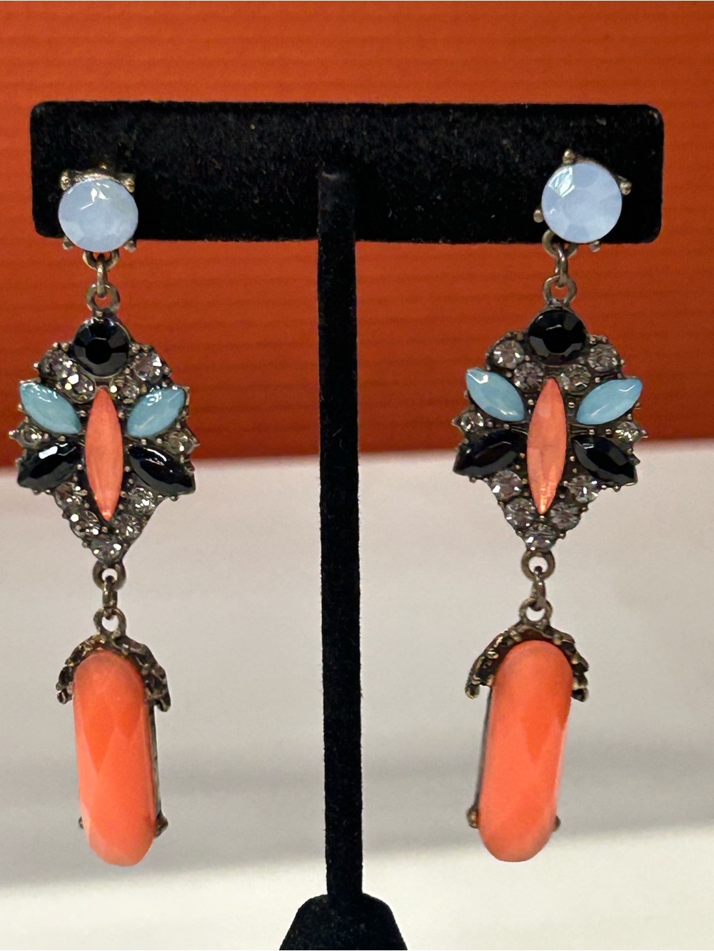 Beautiful coral colored rhinestone earrings